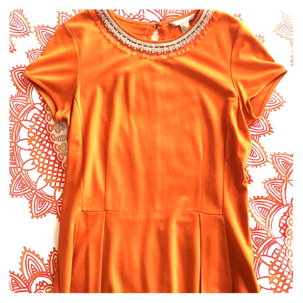 Beaded Neck Peplum Top